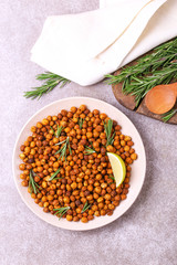 Indian cuisine. Roasted chickpeas with lime and rosemary