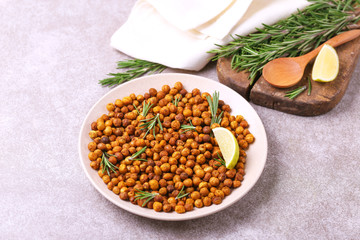Indian cuisine. Roasted chickpeas with lime and rosemary