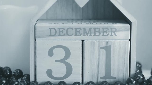 inscription on December 31 on wooden cubes