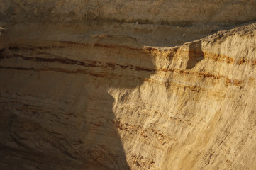 Opencast mining quarry. This area has been mined for sand and other minerals. Restoration of a part of the mined glass sand quarry. Dunes of the sand quarry. Landscapes and Nature