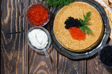 traditional pancakes with red and black caviar
