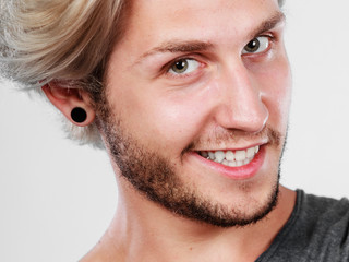Fototapeta premium Happy smiling blonde man close up
