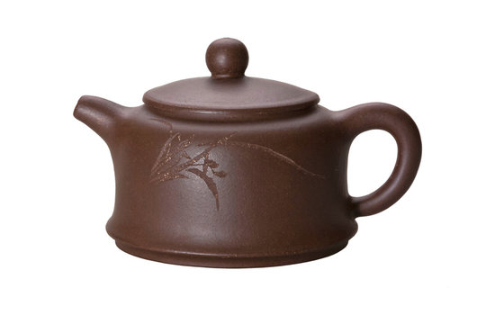 Chinese clay teapot isolated over the white background.