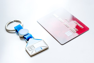 credit cards, key ring - concept mortgage on white background