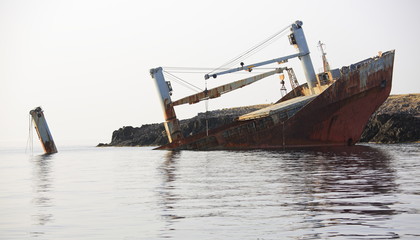 Abandoned broken ship wreck near Kythira island in Greece
