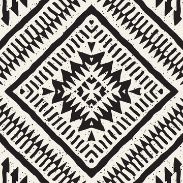 Seamless ethnic and tribal pattern. Hand drawn ornamental stripes. Black and white print for your textiles. Vector background.
