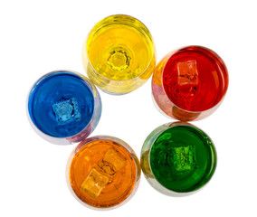 Color of alcoholic and non-alcoholic drinks with ice in Crystal glasses on white background, close-up