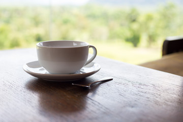 Coffee cup on wooden table