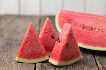 Watermelon on wooden floor
