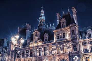 Facade of the main city hall in Paris by night