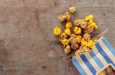 closeup popcorn on wood table. top view