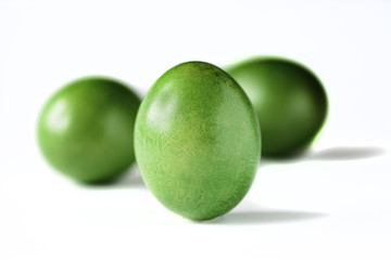 Easter eggs red and green isolated on white background.