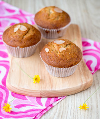 Homemade banana cupcake on wood tray white background, sweet secne for party