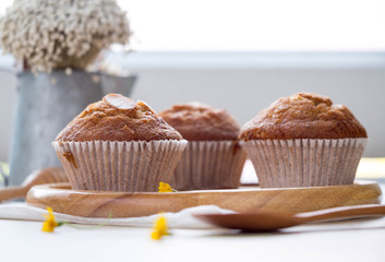 Homemade banana cupcake on wood tray white background, sweet secne for party