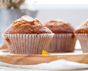 Homemade banana cupcake on wood tray white background, sweet secne for party