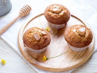 Homemade banana cupcake on wood tray white background, sweet secne for party