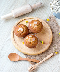 Homemade banana cupcake on wood tray white background, sweet secne for party