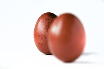 Close up of a red easter egg isolated on white.