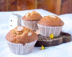 Homemade banana cupcake on wood tray white background, sweet secne for party