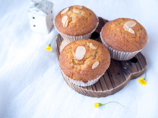 Homemade banana cupcake on wood tray white background, sweet secne for party