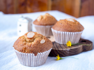 Homemade banana cupcake on wood tray white background, sweet secne for party