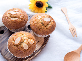 Homemade banana cupcake on wood tray white background, sweet secne for party