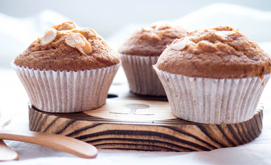 Homemade banana cupcake on wood tray white background, sweet secne for party
