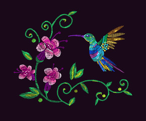 Embroidery. Hummingbirds and exotic flowers