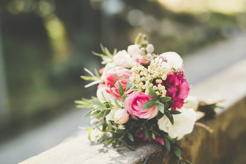 Beautiful wedding bouquet with different flowers, roses