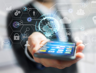 International business network connection displayed on a futuristic interface with technology icon and sphere globe - Worldwide business concept