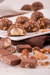 Chocolate truffles with caramel cream filling.