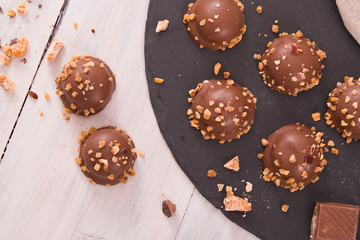 Chocolate truffles with caramel cream filling.