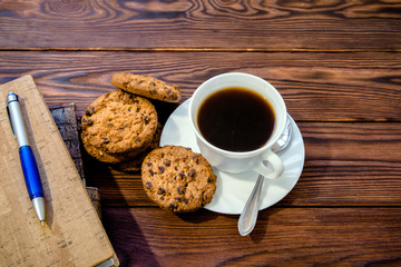    Coffee Break - Notepad and Pen along with coffee 