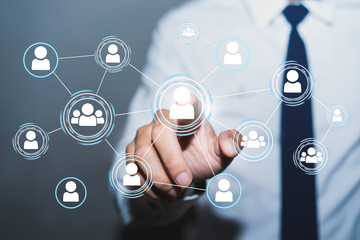 Businessman Pressing a Social Networking Button