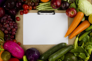 Vegetable and fruit on clipboard with paper, healthy food framed on clipboard and paper for salad menu or special promotion concept.