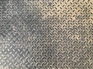 Texture of dirty metal plate with tiles and light gradient
