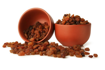 Delicious and fresh raisins isolated on white background, including clipping path without shade.