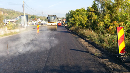 Road construction machinery in activity