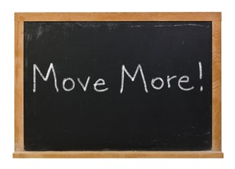 Move more written in white chalk on a black chalkboard isolated on white