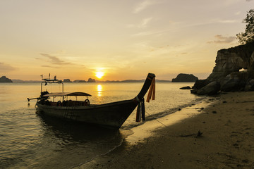 Fishing boat on the background of the beautiful sunset Colorful Krabi island The island of Thailand The rest of paradise Relaxation