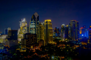 Fototapeta na wymiar Beautiful panorama view of nightlife of Bangkok city and buildings