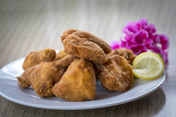 typical austrian meal, fried chicken named backhendl