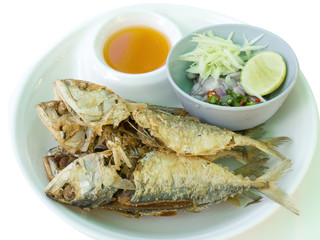 Fried mackerel fish on dish with Chili pepper onion. thai food