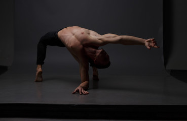 men is dances in a black pants