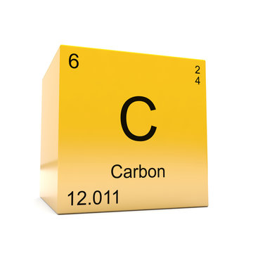 Carbon chemical element symbol from the periodic table displayed on glossy yellow cube