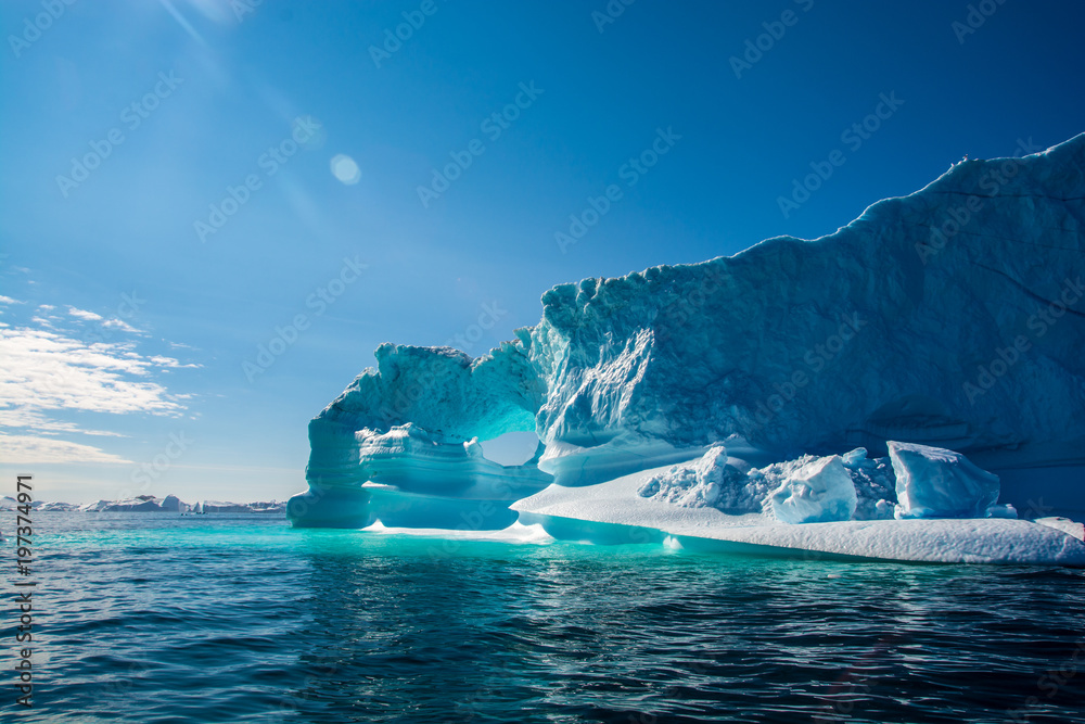 Wall mural amazing shine of iceberg. iceberg in greenland