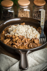 Barley groats with stewed meat.