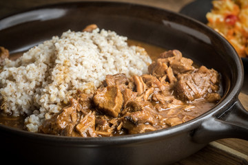 Barley groats with stewed meat.