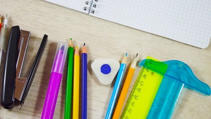 A variety of stationery on the table.