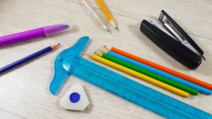 A variety of stationery on the table.